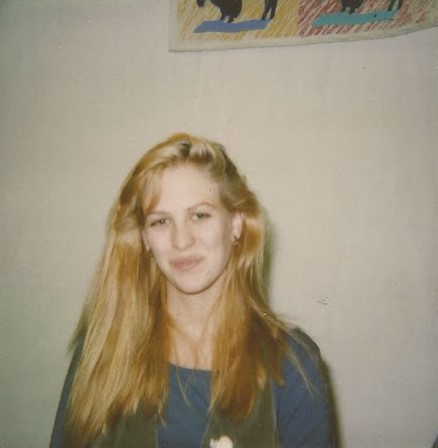 Photo of young Sabrina smiling