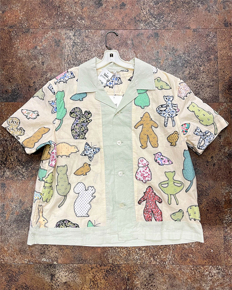 A pastel men's shirt with appliqued animals and embroidery by brand BODE