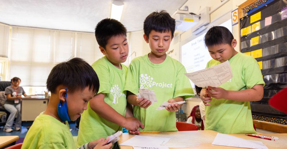 Young member of the Go Project work on an assignment